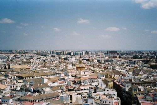 Free Aerial view of Seville's vibrant cityscape showcasing historical and modern architecture. Stock Photo