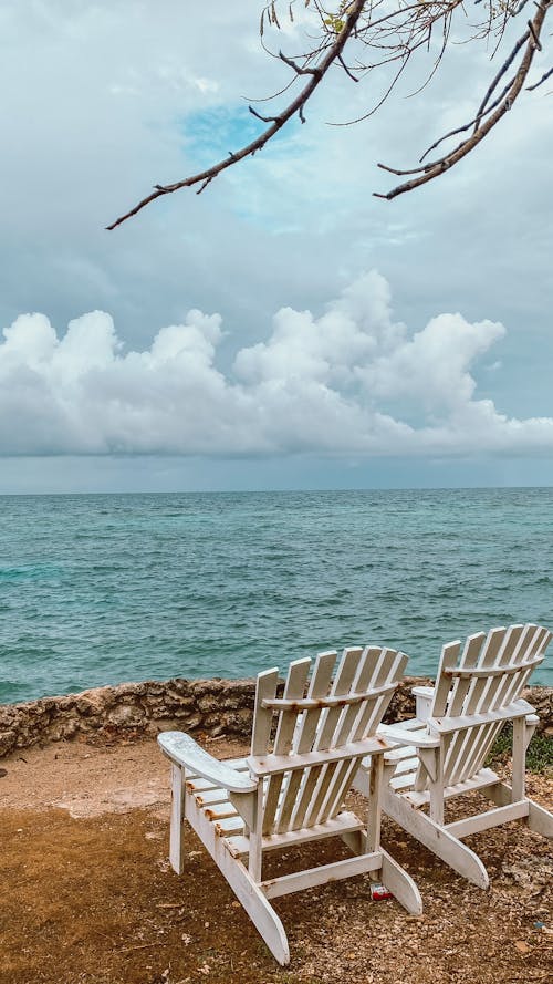 deniz, deniz kıyısı, dikey atış içeren Ücretsiz stok fotoğraf