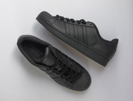 Stylish black shoes on white background