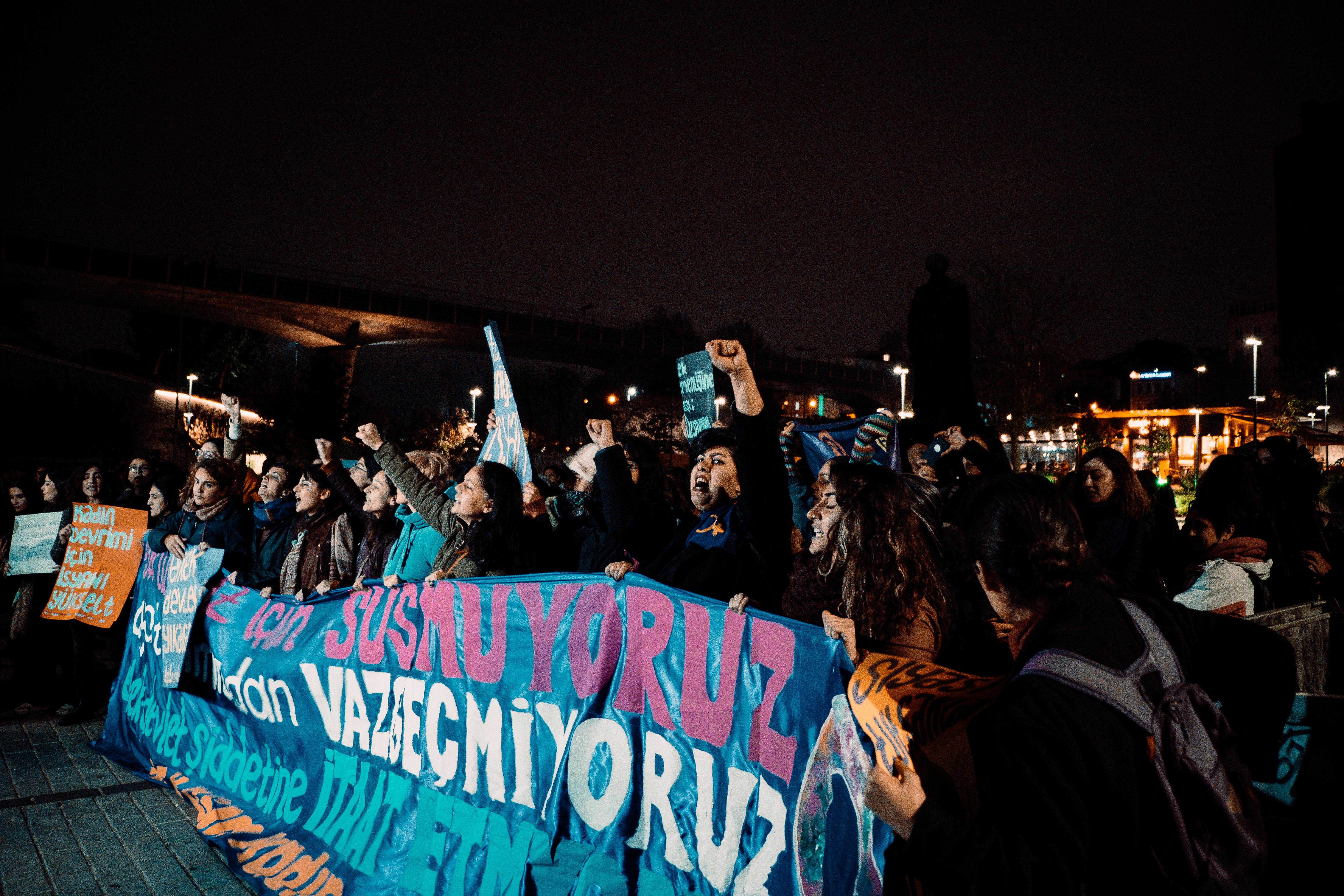 people on a street demonstration at night