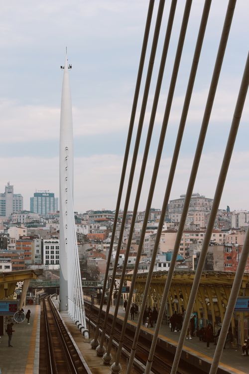 Free Urban scene featuring the Golden Horn Bridge and surrounding Istanbul cityscape under a blue sky. Stock Photo