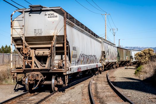 Brown and Black Train on Rail Tracks