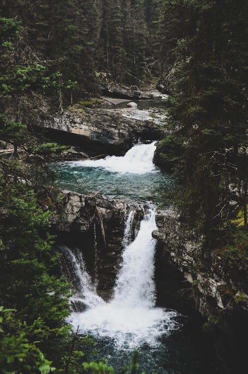 Free Birds Eye View of a Cascading Waterfall Stock Photo