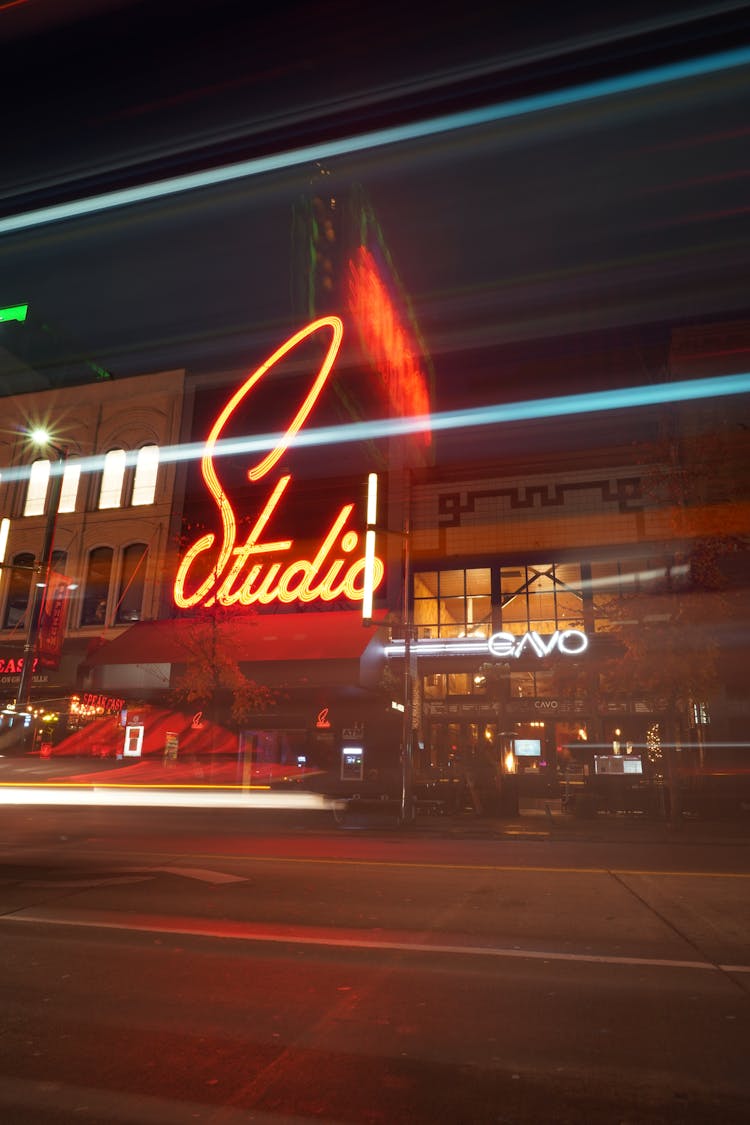 Neon On Window Near Street At Night