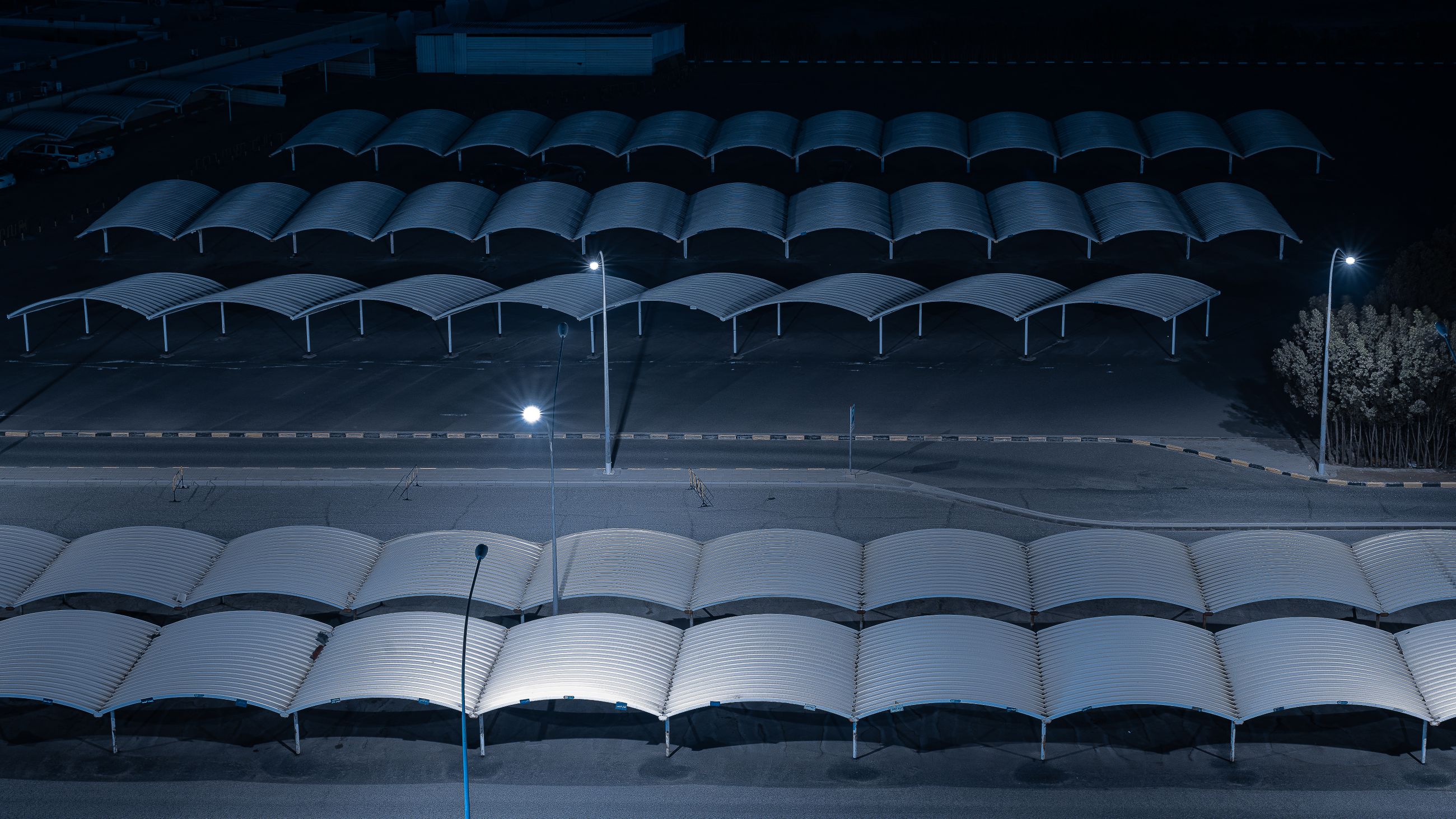 Large commercial parking lot at night
