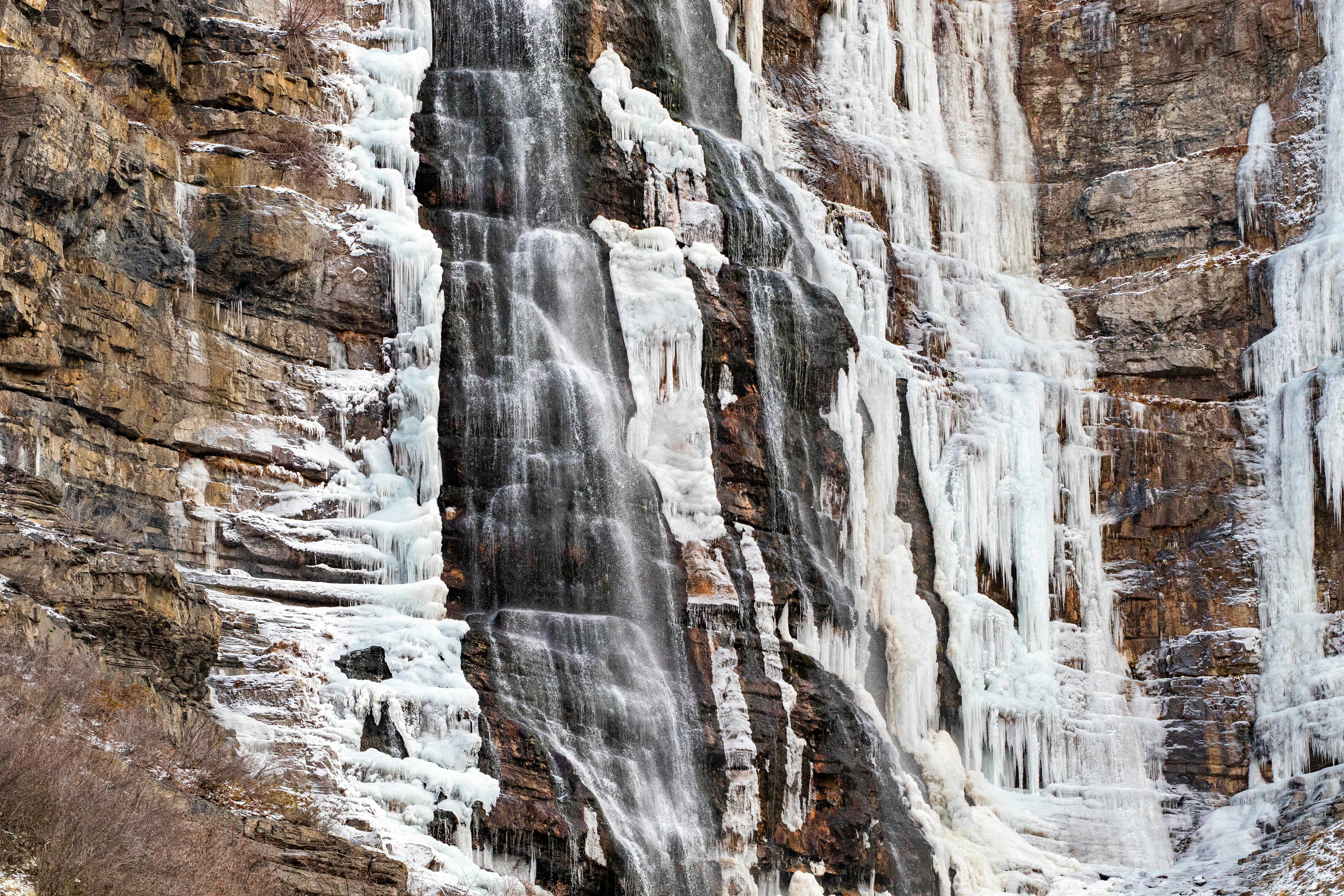 rocks covered with ice of a freezing waterfall