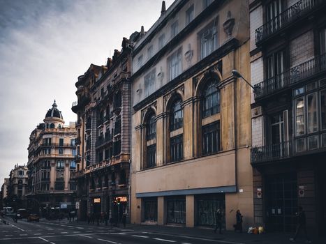 Explore the timeless beauty of elegant urban architecture with classic facades on a city street.