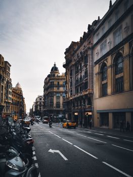 Explore the stunning architecture and bustling streets of Barcelona in this street view photo.