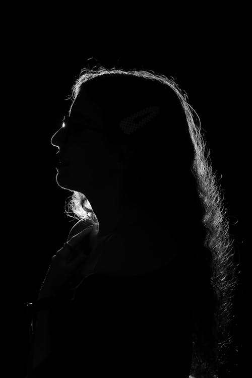 Portrait of a Woman against a Dark Background