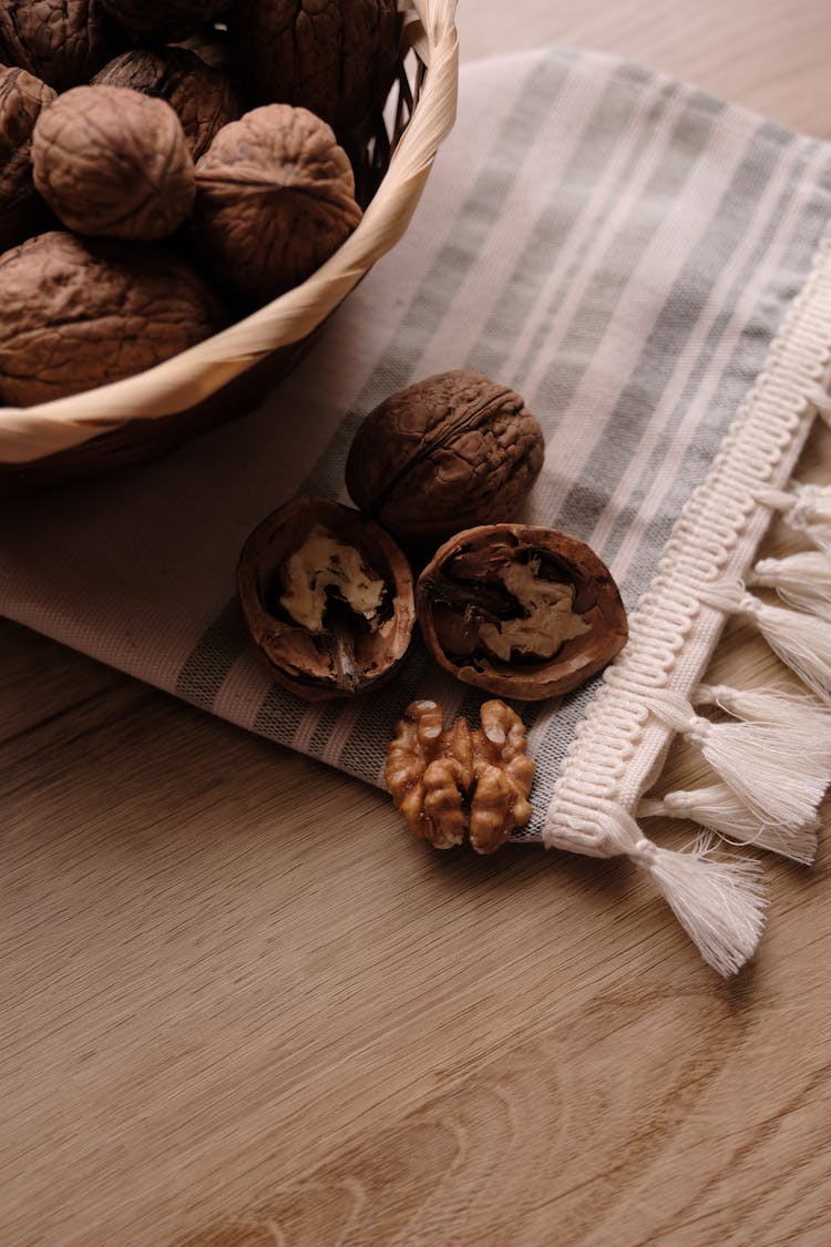 Nuts On Fabric And In Basket