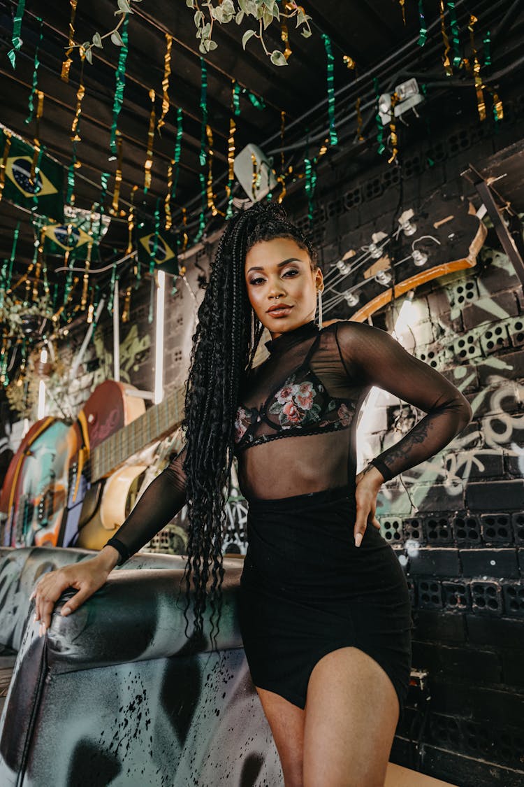 Beautiful Woman With Braids In Bar