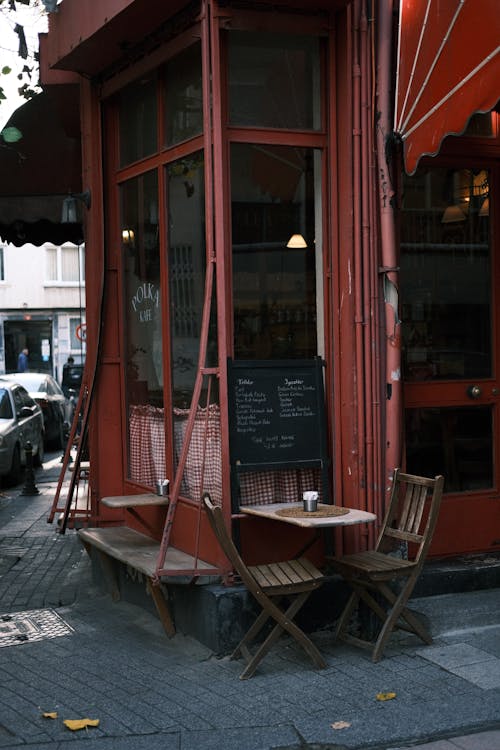 Table and Chairs Beside a Coffee Shop