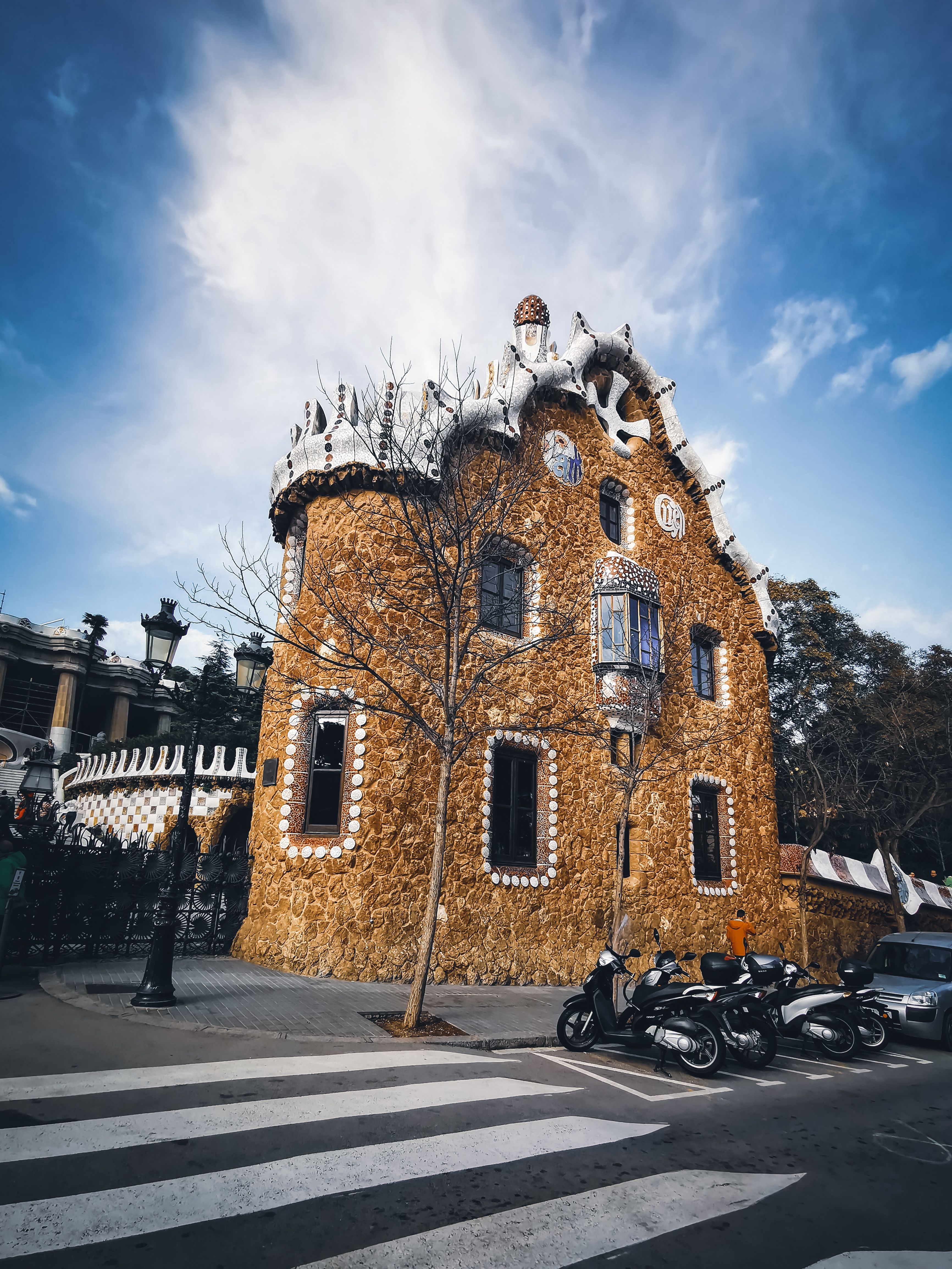 Decorated Building near Zebra Crossing · Free Stock Photo