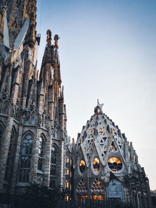 Free Stunning view of La Sagrada Familia in Barcelona during twilight, showcasing its intricate architecture. Stock Photo