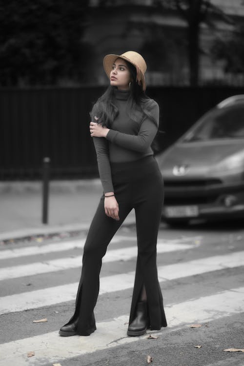 Fashionable Young Woman Posing on a City Street 