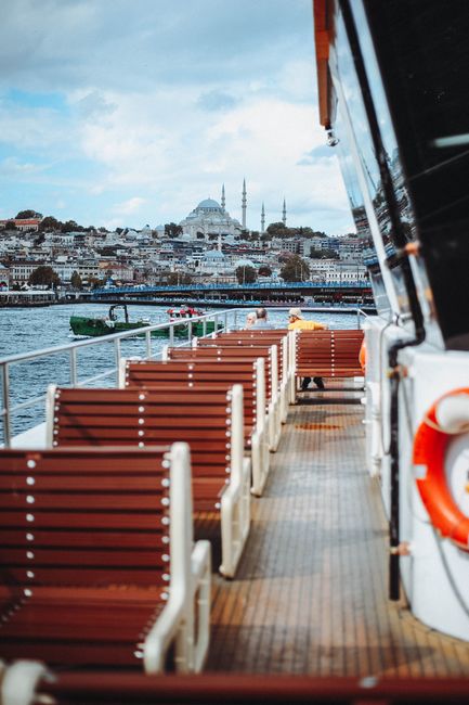 Capture the serene beauty of Istanbul's Bosphorus with a clear view of Hagia Sophia from a ferry.
