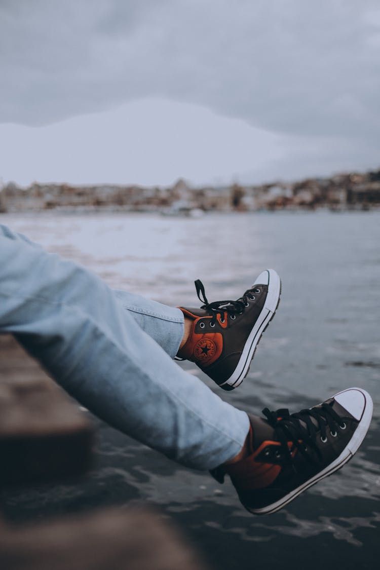 Man Legs On Water Background