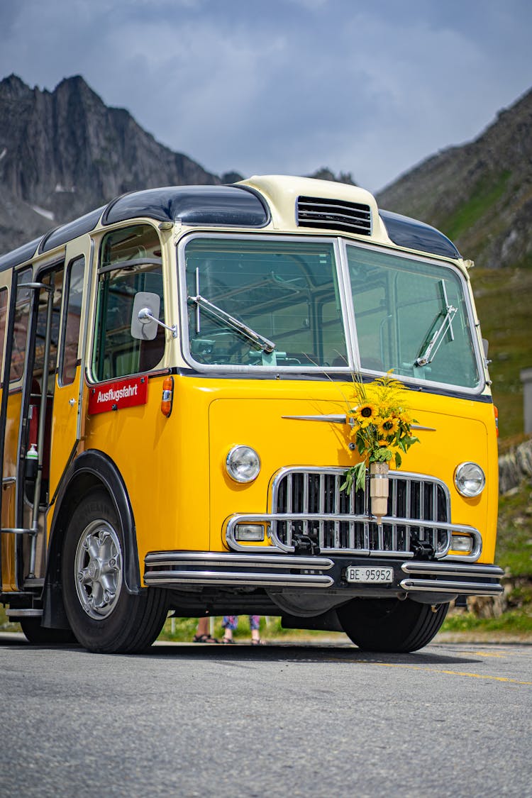 Yellow Vintage Bus On The Road