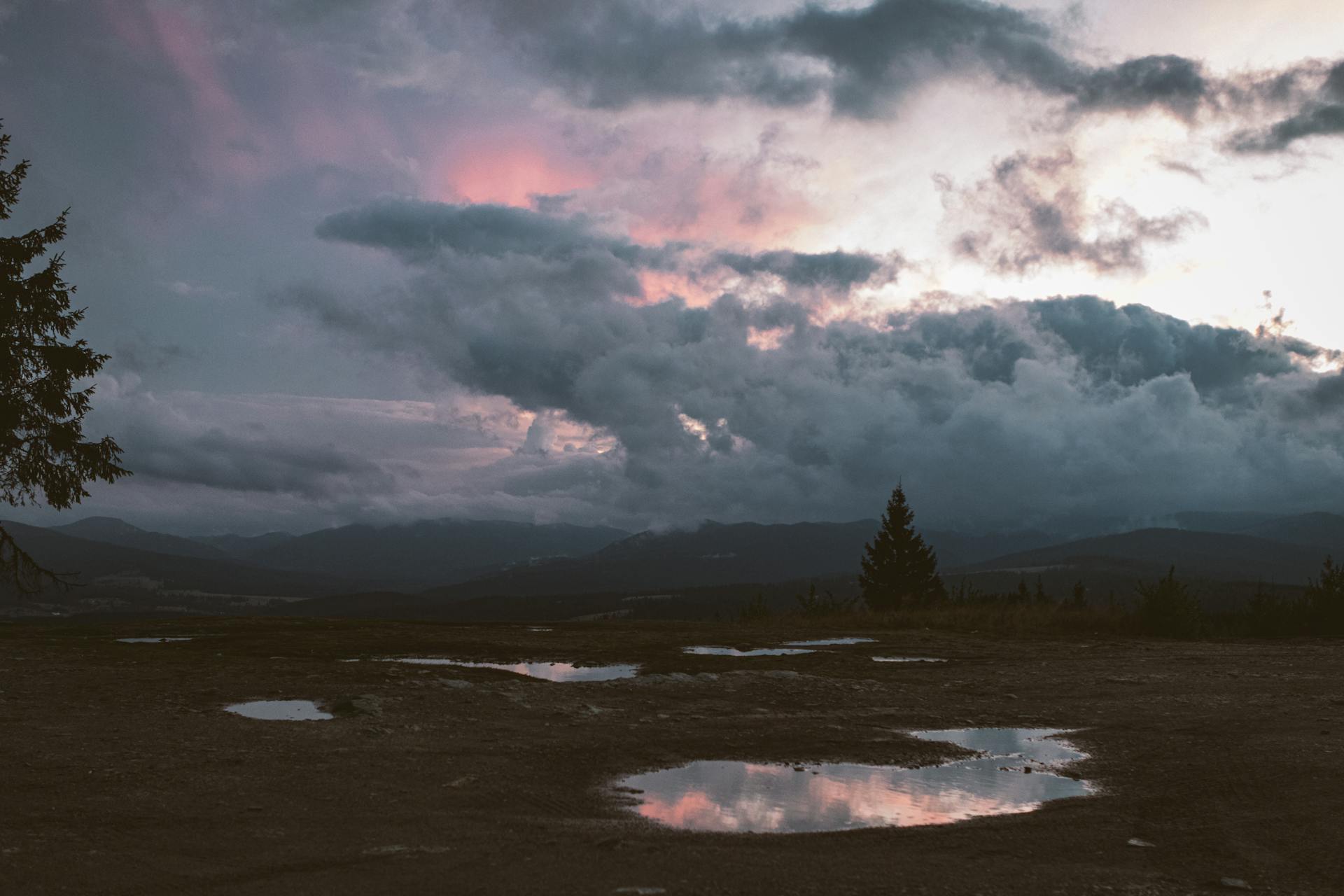Sunset Reflecting in Puddles on a Field