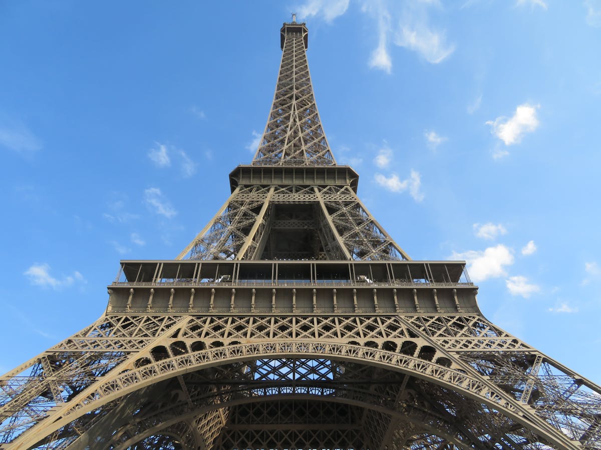 Modern train traveling through a scenic mountain landscape