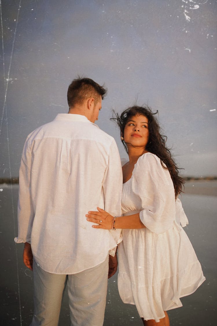 Young Couple On The Beach 