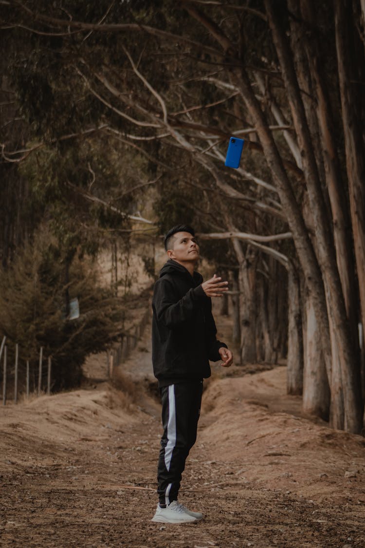 Man Tossing His Smart Phone 