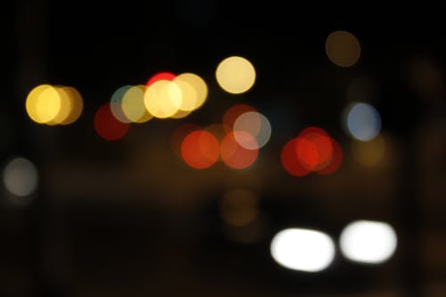 주황색, 빨간색 및 흰색 Bokeh 조명