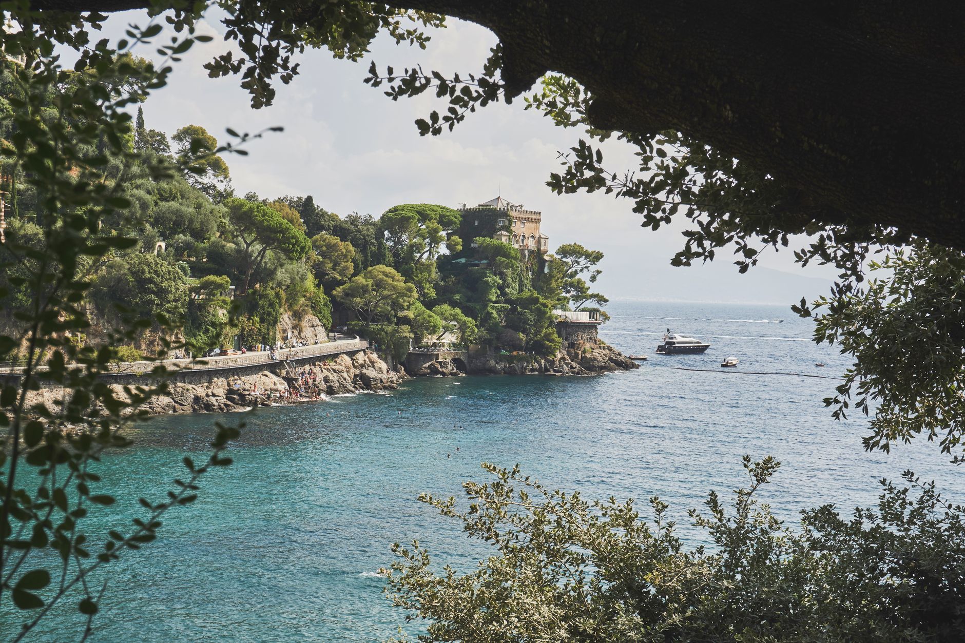 A sophisticated luxury lounge overlooking a private yacht harbor, symbolizing the curatorial excellence of global travel.