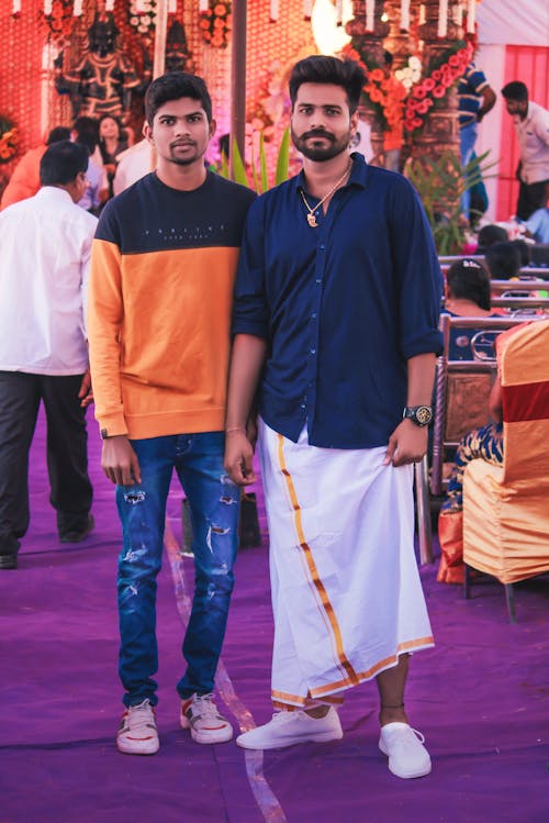 Two Men Clicking Image In Indian Wedding