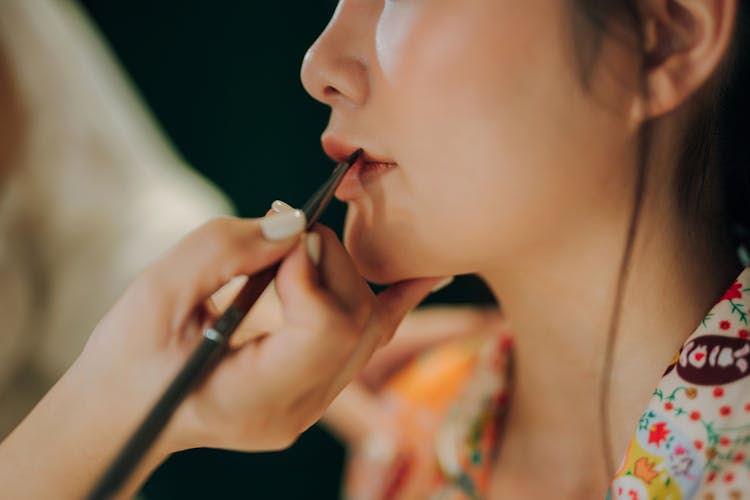 Close-Up Shot Of A Woman Getting A Makeup