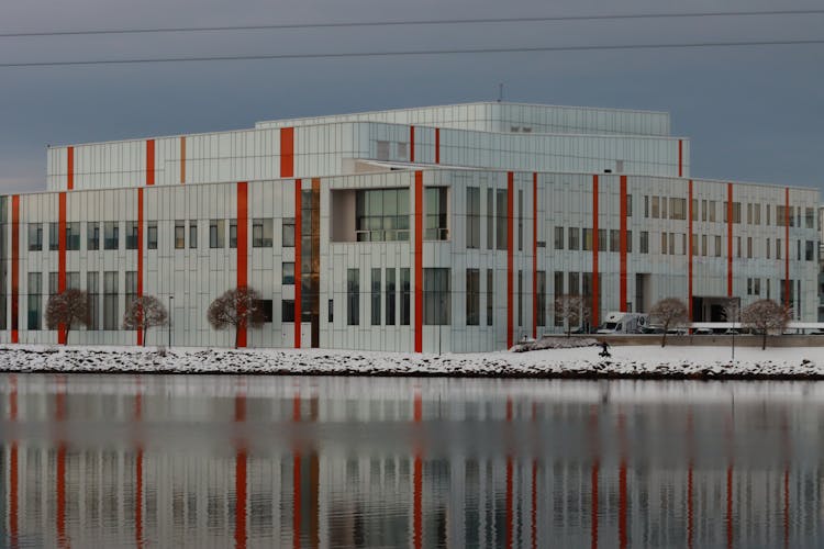 Building Near Water In Town In Winter