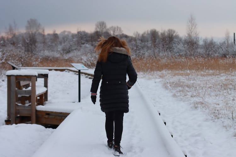 Woman In Jacket Walking