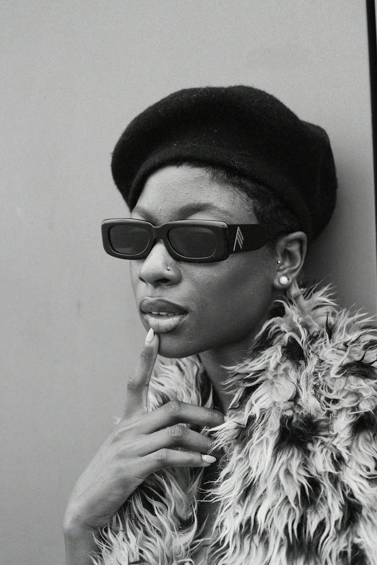 Woman In Hat And Sunglasses