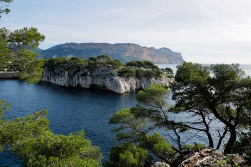 Free Scenic aerial view of Calanques National Park's rocky coastline and deep blue waters. Stock Photo