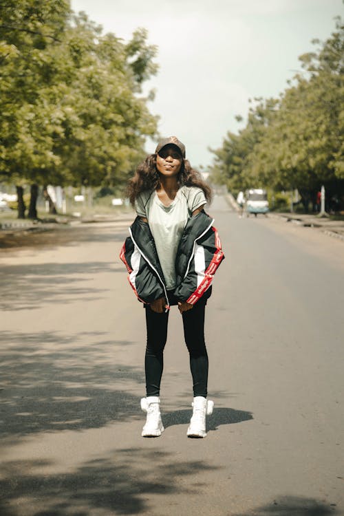 Casual Style Brunette in Cap and Jacket