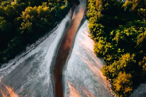 Free A stunning aerial capture of a winding river through lush forests in Kuantan, Pahang, Malaysia. Stock Photo