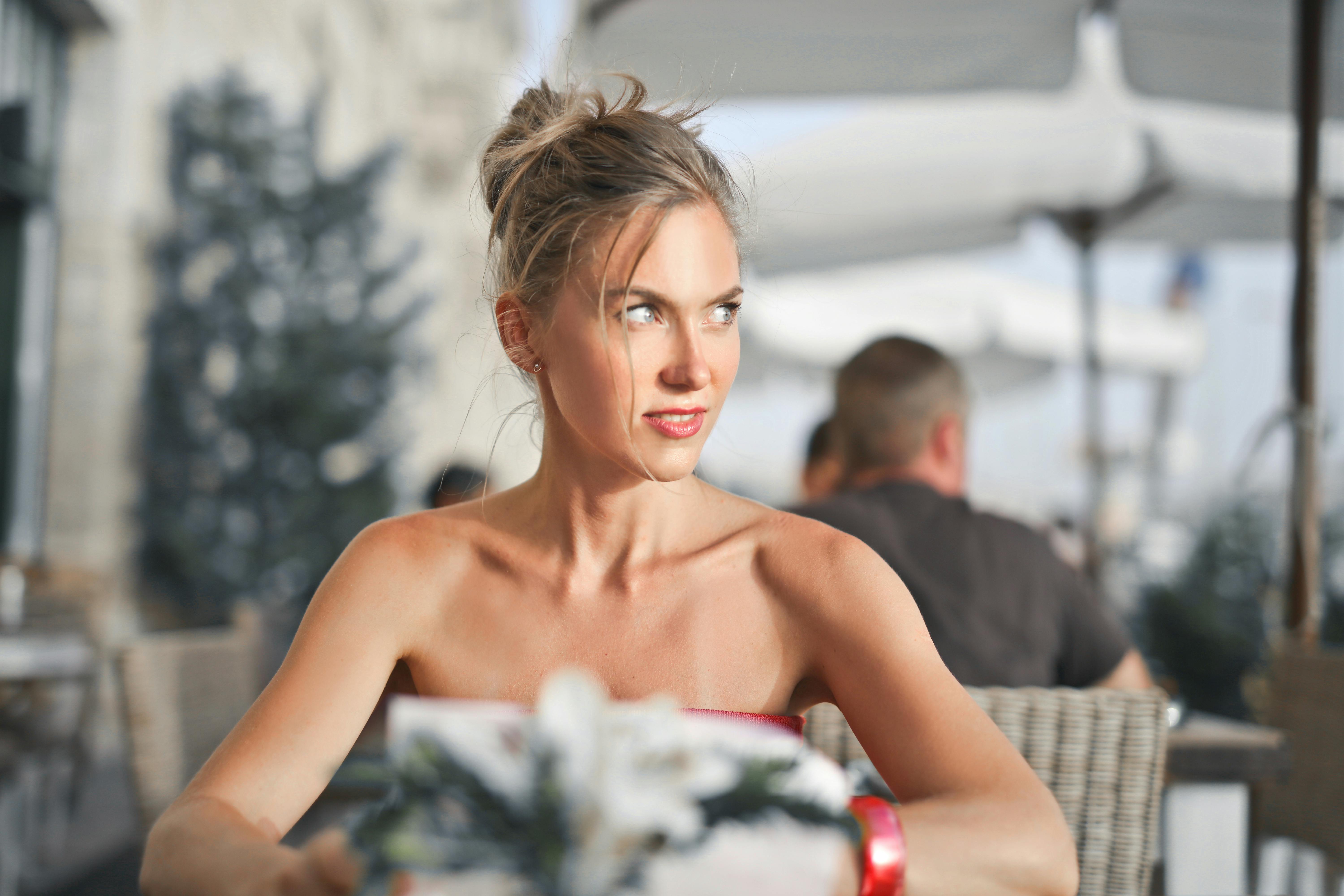 Selective Focus Photography of Roman Wearing Tube Top · Free Stock Photo