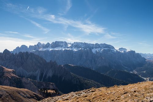 Free A breathtaking view of the Dolomite mountains under a clear blue sky, showcasing their grandeur. Stock Photo