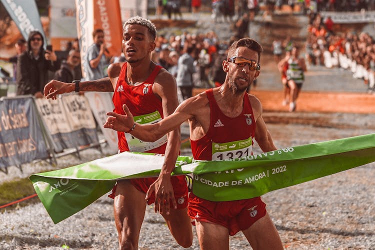 Photo Of Men At The Finish Line