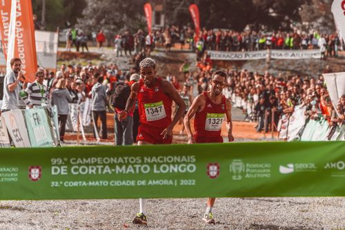 Free Runners crossing the finish line at Portugal's Corta Mato Longo national championship. Stock Photo