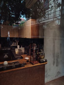 Cozy café interior reflecting urban environment, enhancing ambiance.