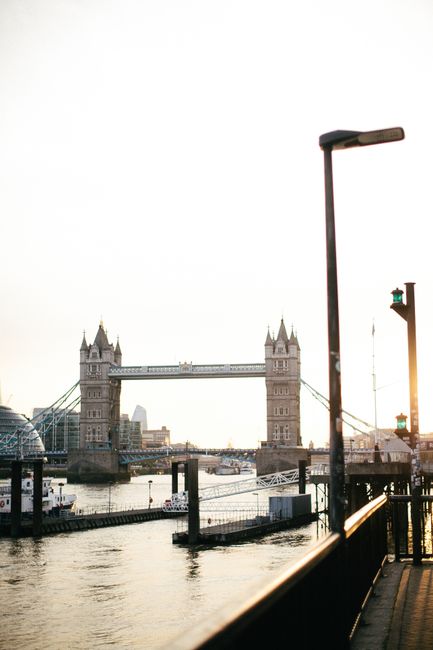 Iconic Tower Bridge in London seen at sunset, highlighting its architectural elegance over the River Thames.