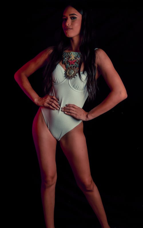 A Sexy Woman in White Bikini Posing