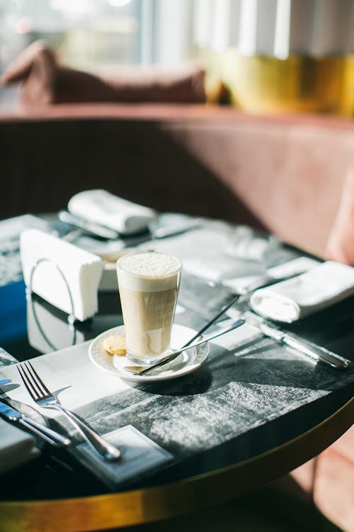 Free Clear Glass Cup Filled With Brown Liquid Stock Photo