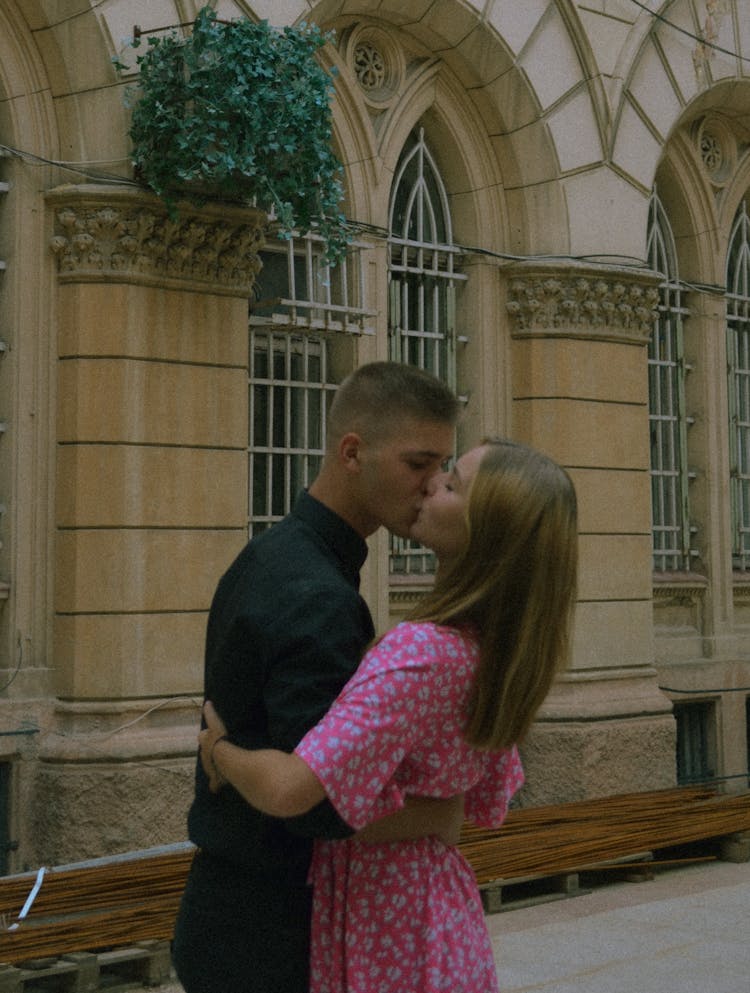 Man And Woman Kissing