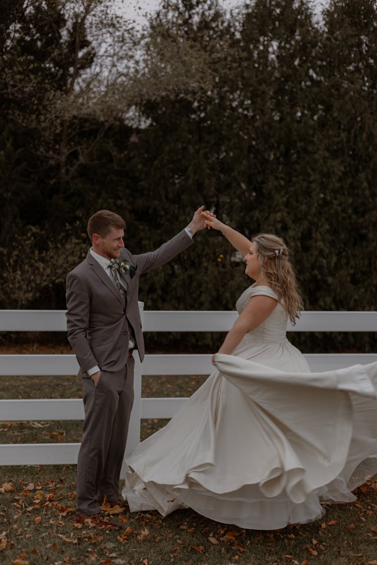 A Newlywed Couple Dancing