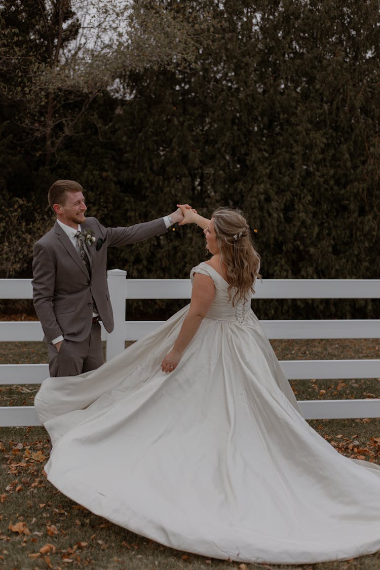 A Newlywed Couple Dancing