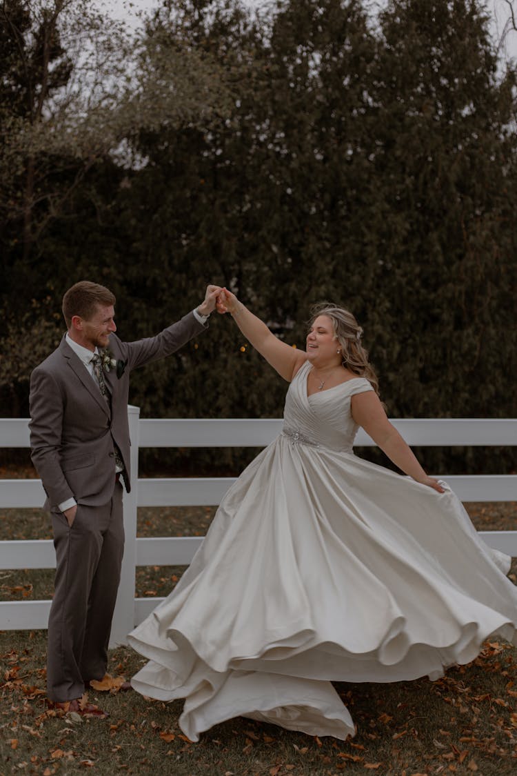 A Newlywed Couple Dancing