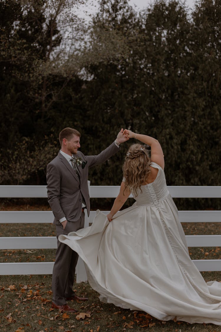 A Newlywed Couple Dancing