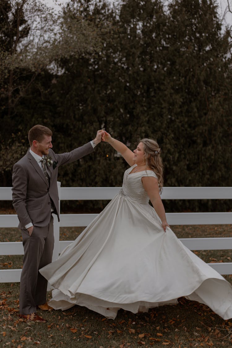 A Newlywed Couple Dancing